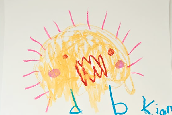 A child's colorful drawing of an original spiky character